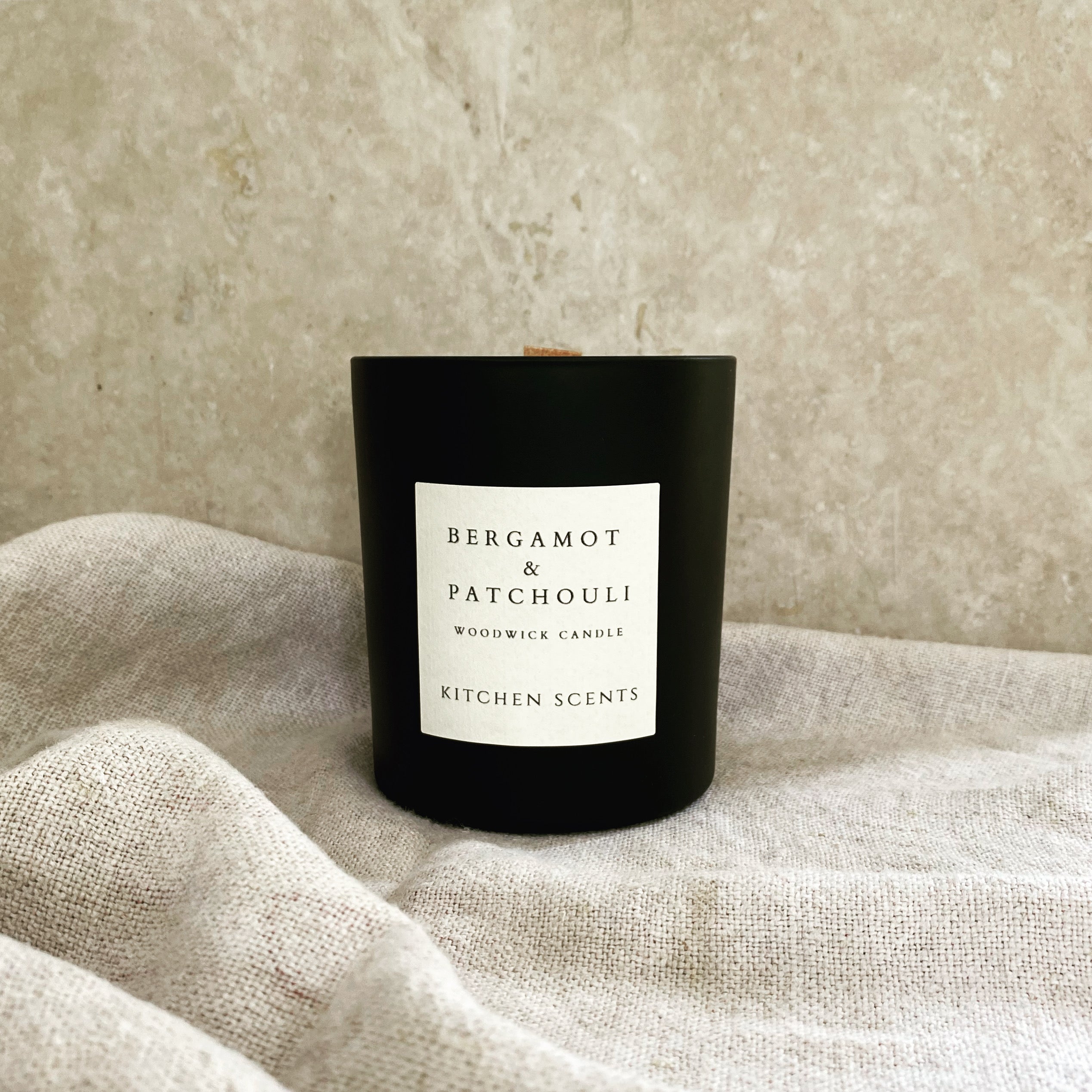 bergamot and patchouli scented soy wax wood wick candle 