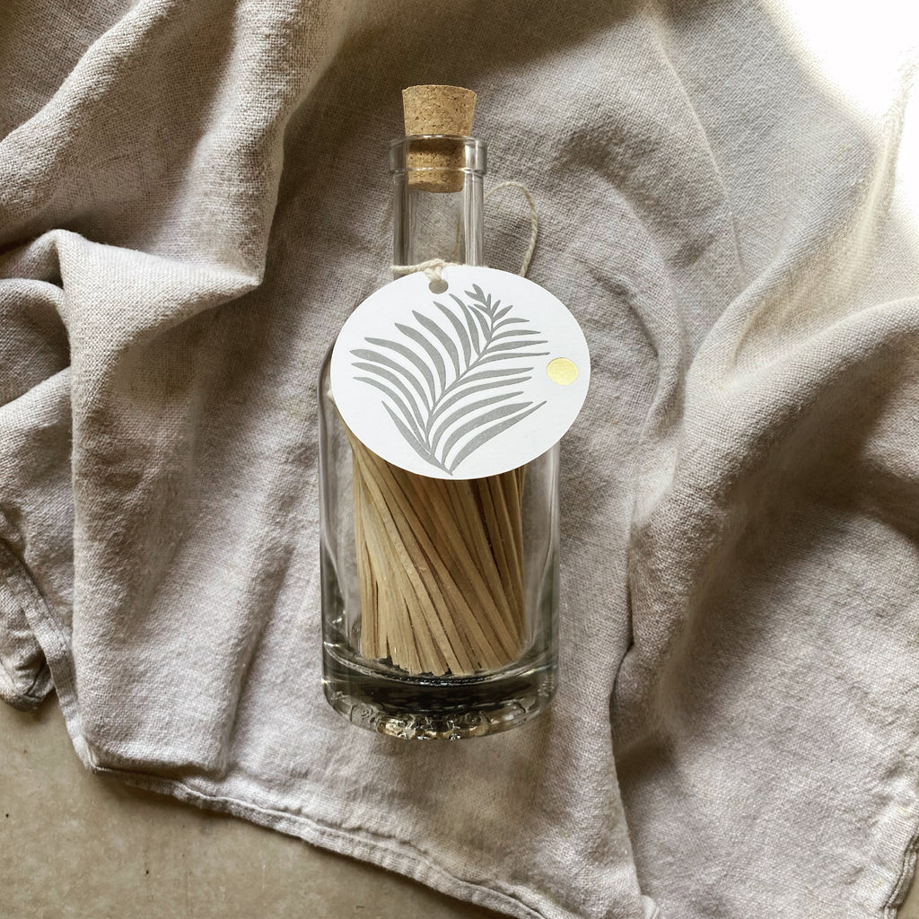 fern label match bottle with white tipped matches