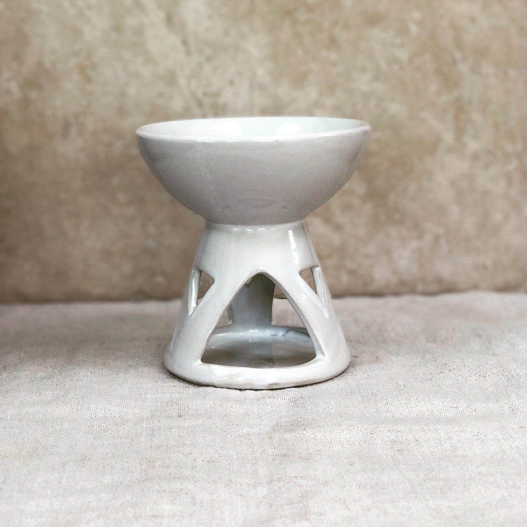 white ceramic oil burner front view