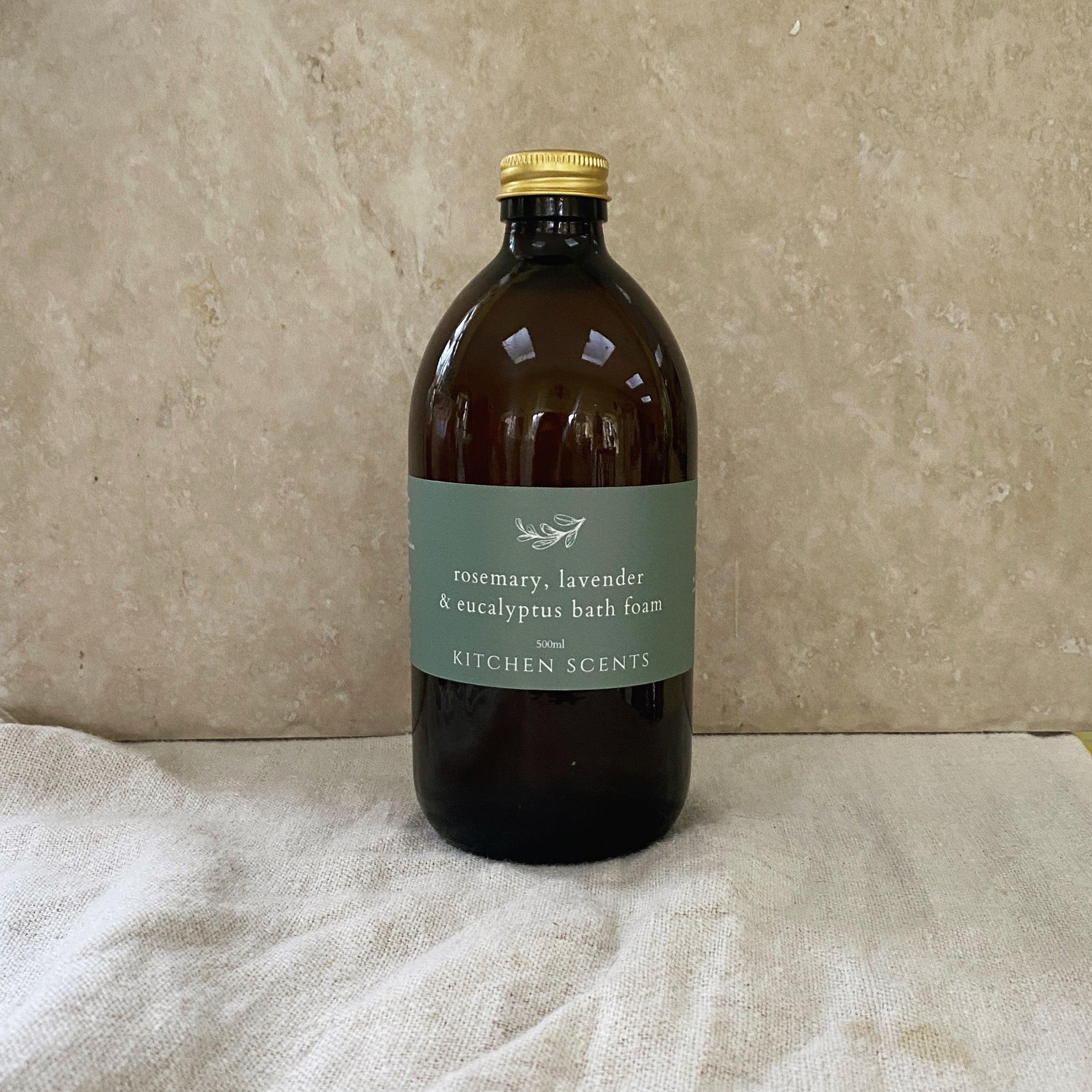 rosemary lavender and eucalyptus bath foam with essentials oils in amber jar