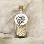 fern label match bottle with white tipped matches