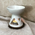 white ceramic oil burner with soy wax tea light side view