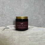 orange and clove scented soy wax candle 